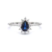 White gold ring with diamonds 0.08 ct and sapphyre 0.48 ct