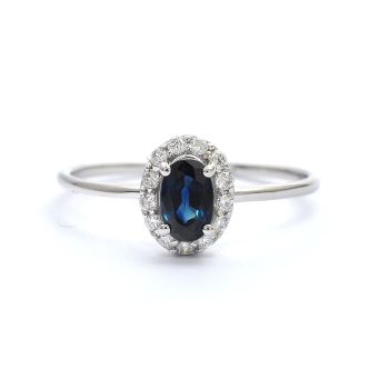 White gold ring with diamonds 0.14 ct and sapphyre 0.52 ct
